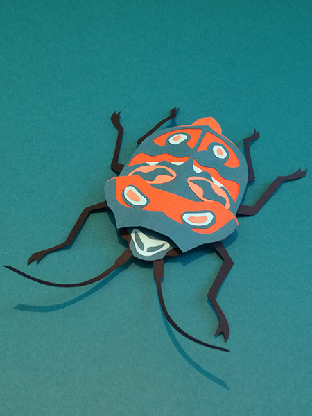 Insecte imaginaire en papier découpé