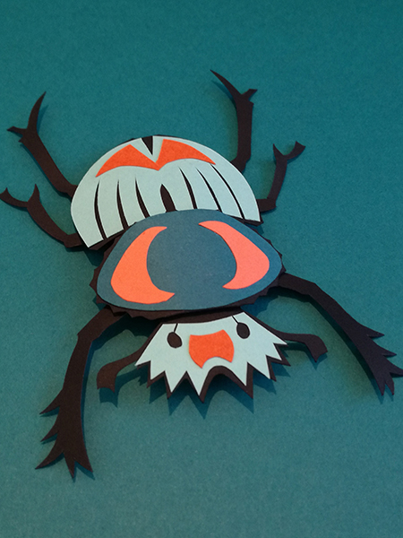 Insecte imaginaire en papier découpé